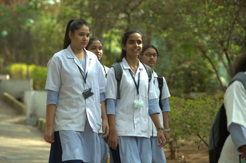 Students on campus at Sushrutha Ayurvedic Medical College